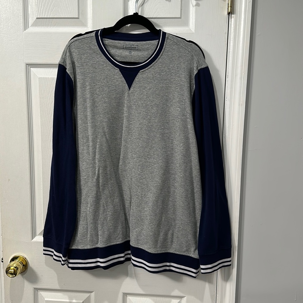 Grey and blue crewneck.